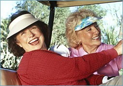 Ladies in golf cart